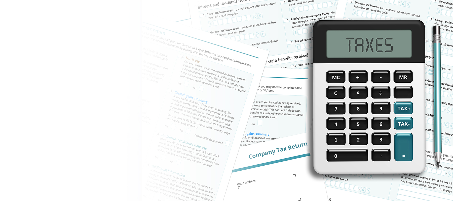 Calculator and pencil on top of tax papers